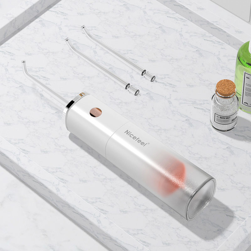 Limpieza profunda portátil de Sonic Cordless Water Flosser Rechargeable con cuatro bocas